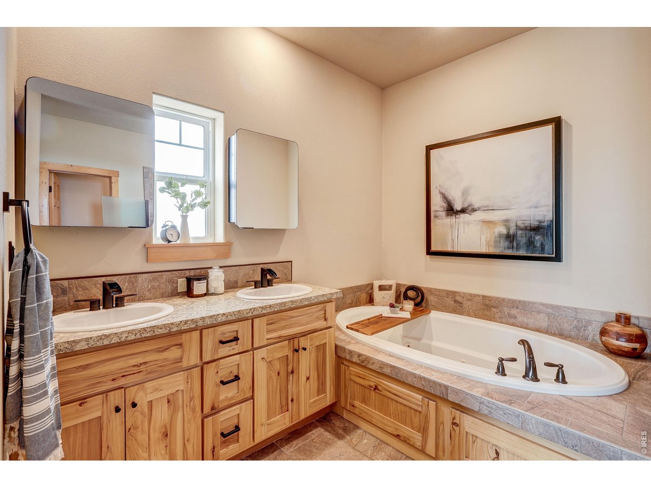 18298 Romar Ranch Road Carr, CO 80612 - Photo 22 of 49 a bathroom with a sink and a bathtub