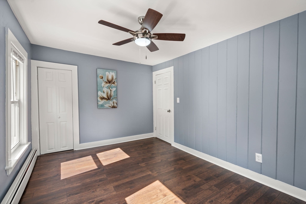 448 Washington Street Warren, MA 01083 - Photo 22 of 42 wooden floor in an empty room with a window