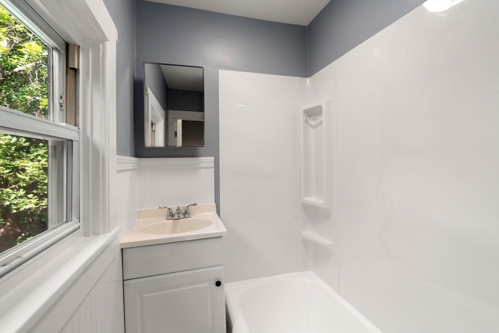 448 Washington Street Warren, MA 01083 - Photo 23 of 42 a bathroom with a sink and mirror