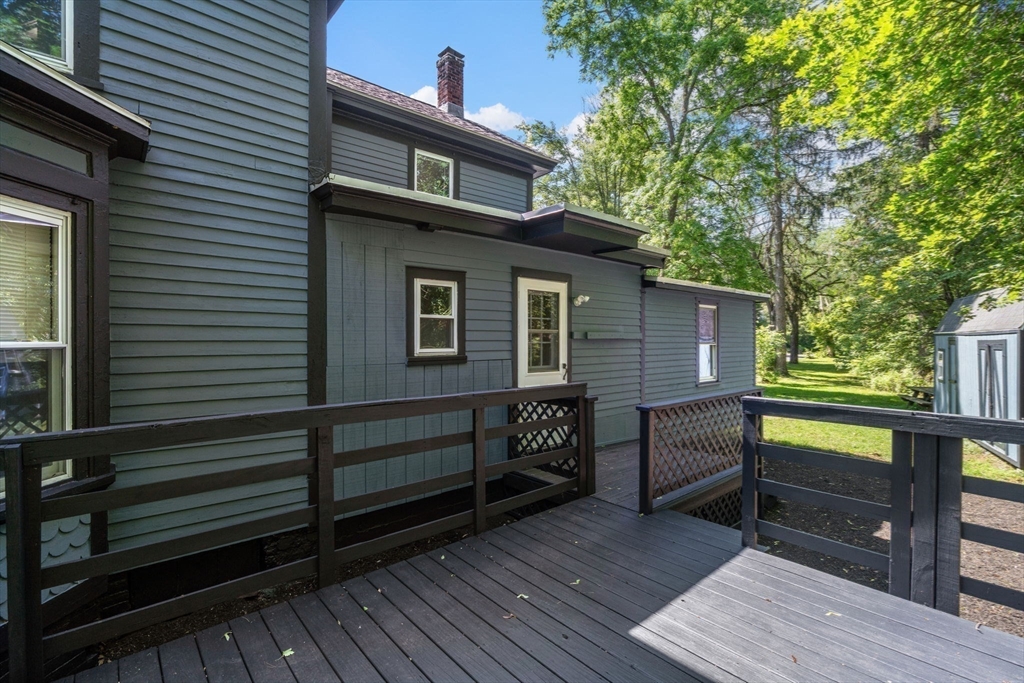 448 Washington Street Warren, MA 01083 - Photo 35 of 42 a front view of a house with a balcony