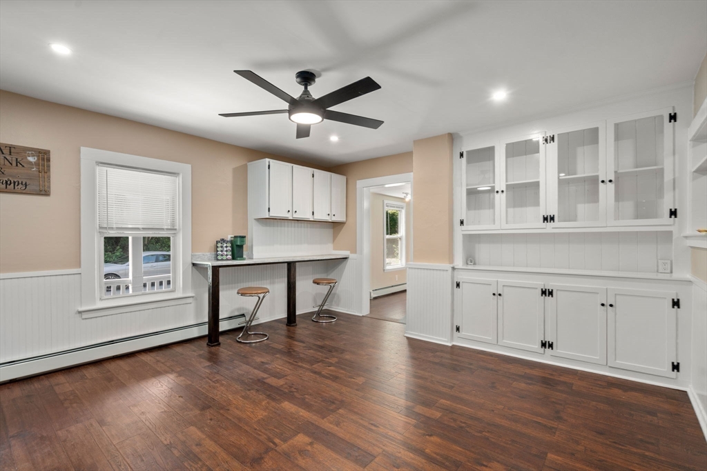 448 Washington Street Warren, MA 01083 - Photo 9 of 42 a view of a kitchen with wooden floor and a window