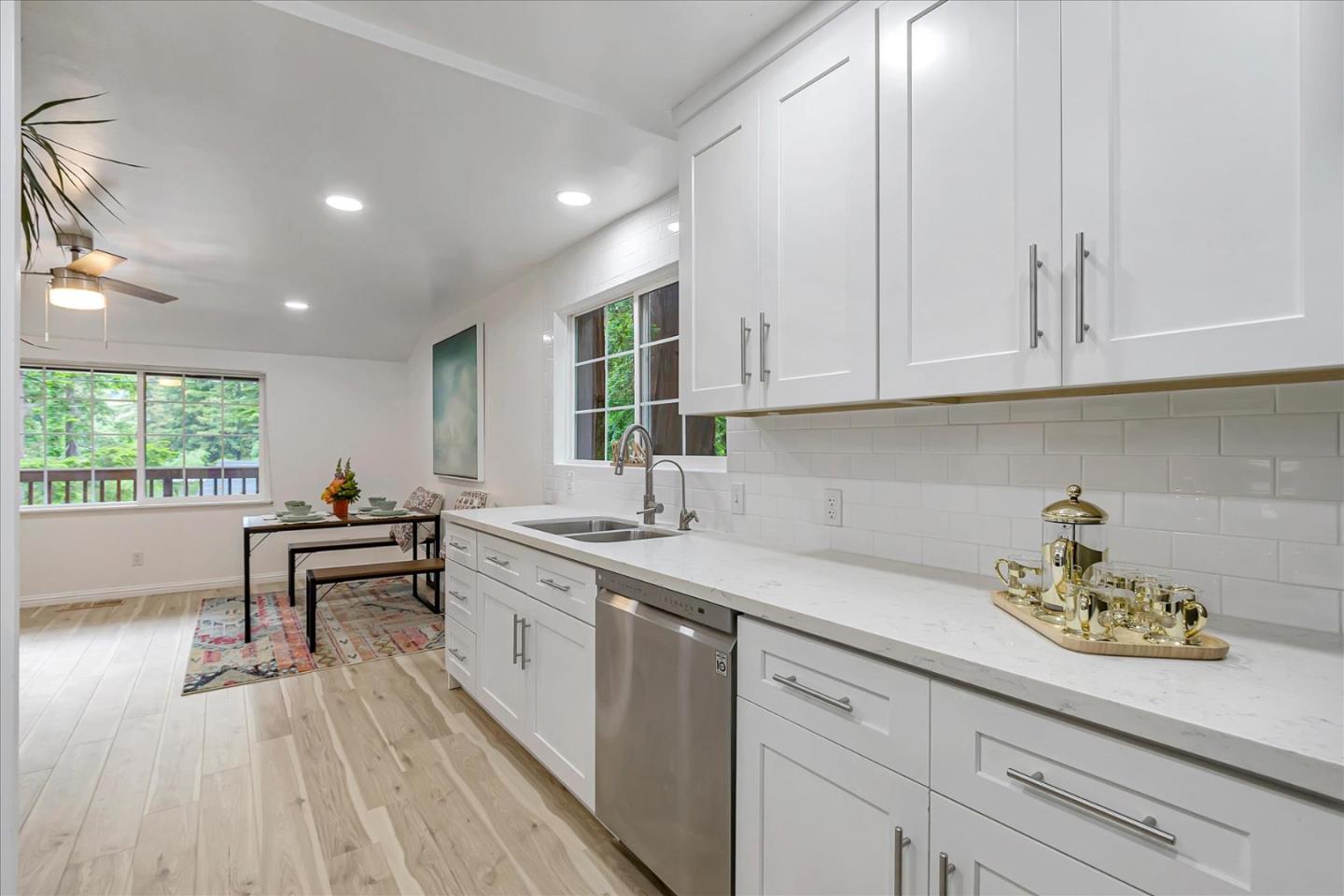 17550 Comanche Trail Los Gatos, CA 95033 - Photo 15 of 37 a kitchen with a sink cabinets and window