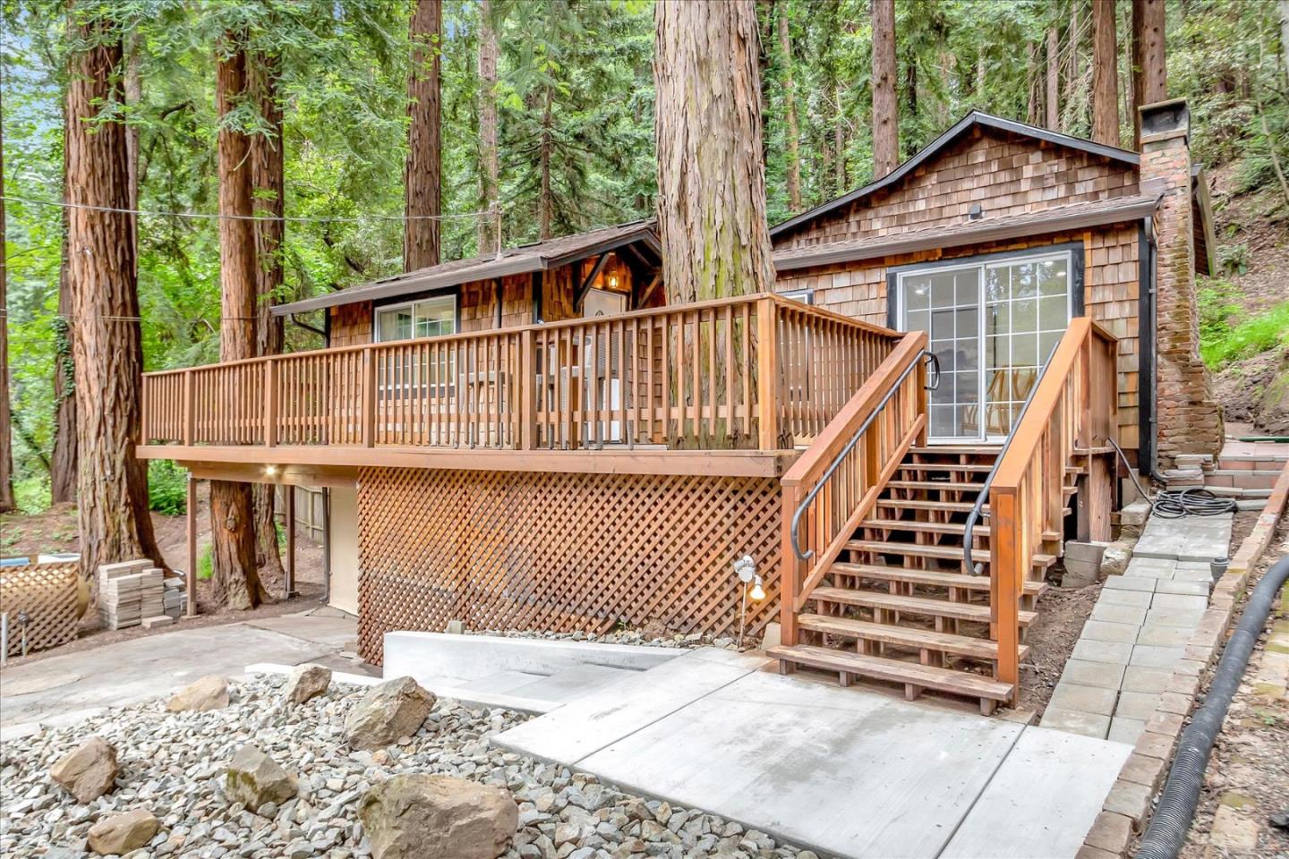 17550 Comanche Trail Los Gatos, CA 95033 - Photo 2 of 37 a view of a house with backyard and deck