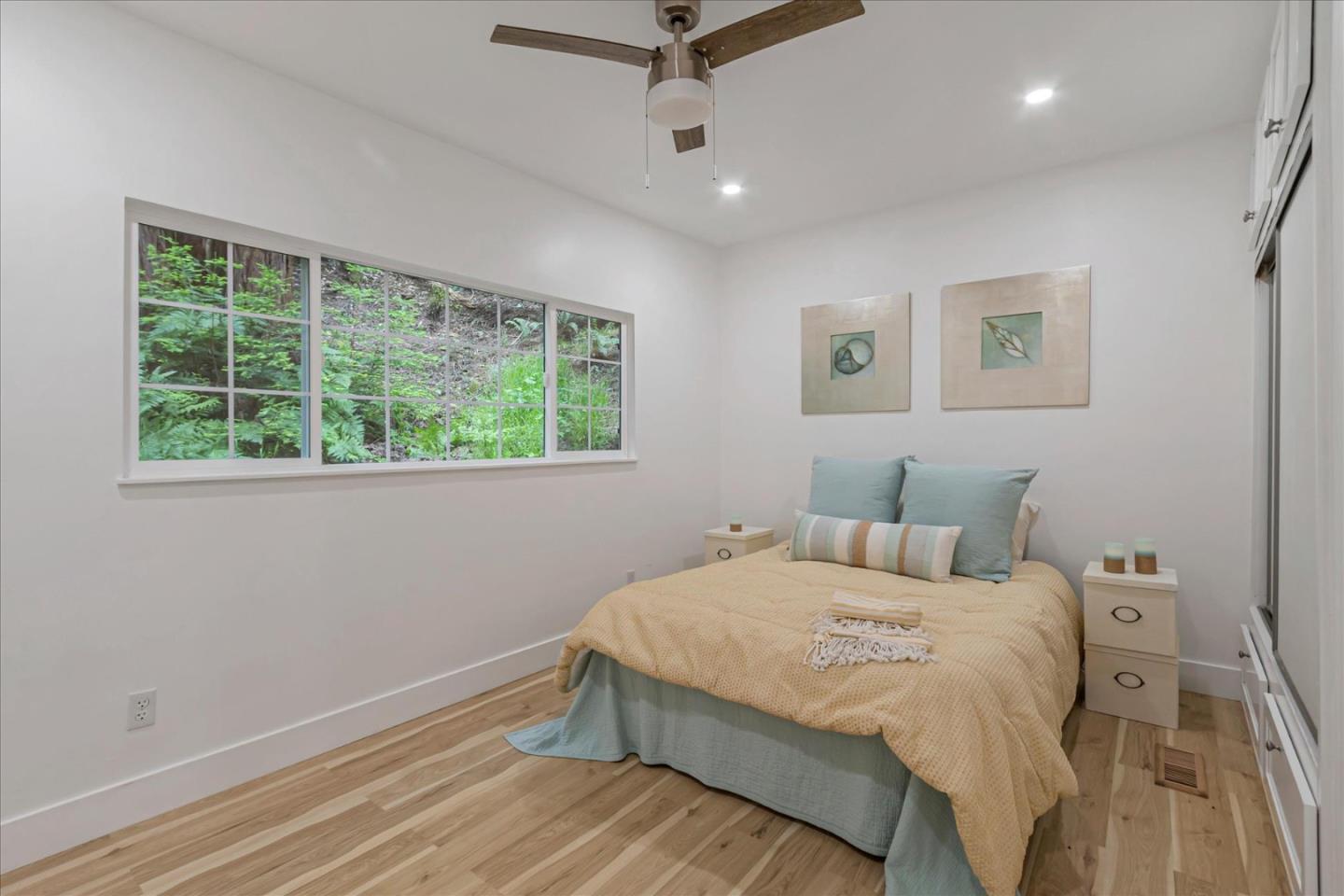 17550 Comanche Trail Los Gatos, CA 95033 - Photo 23 of 37 a bedroom with a bed and a window