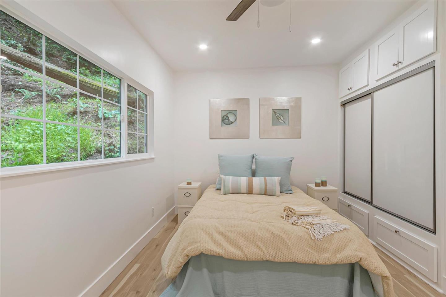 17550 Comanche Trail Los Gatos, CA 95033 - Photo 24 of 37 a bedroom with a bed and a window