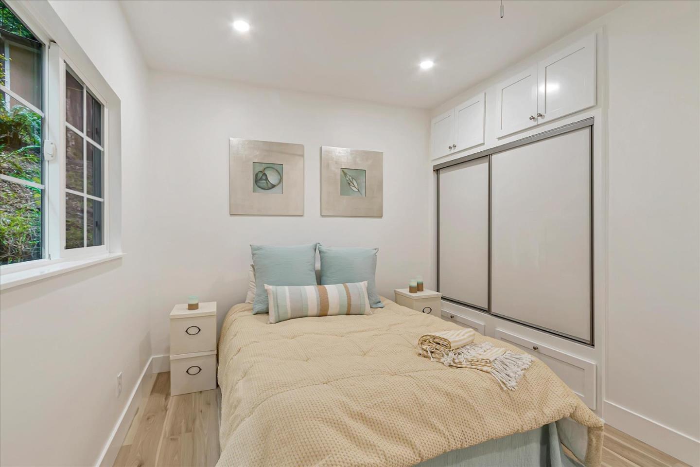 17550 Comanche Trail Los Gatos, CA 95033 - Photo 25 of 37 a bedroom with a bed and a window