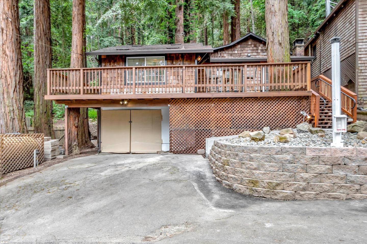 17550 Comanche Trail Los Gatos, CA 95033 - Photo 3 of 37 a front view of a house with yard and sitting area
