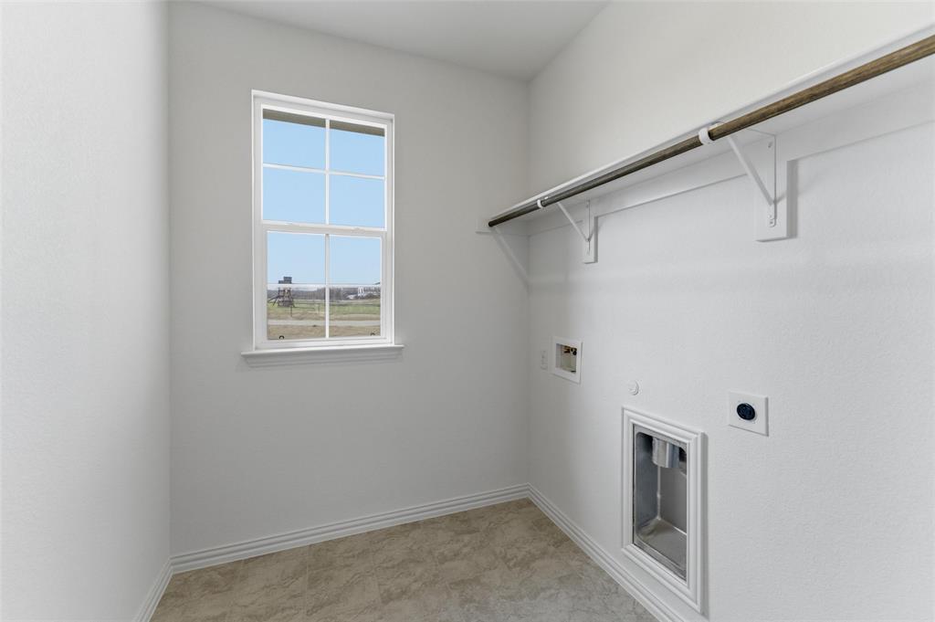 144 Oak Grv Way Springtown, TX 76082 - Photo 16 of 27 a view of a room that has a window in it