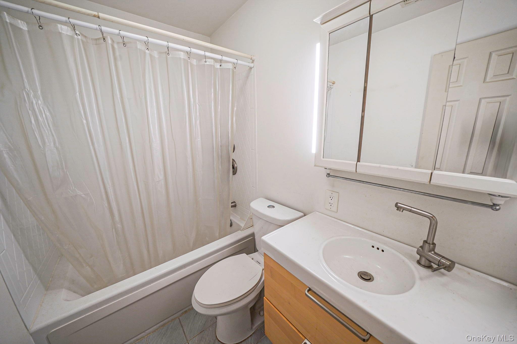 97 Locust Drive Rocky Point, NY 11778 - Photo 22 of 26 Full bath featuring vanity and shower / bath combo