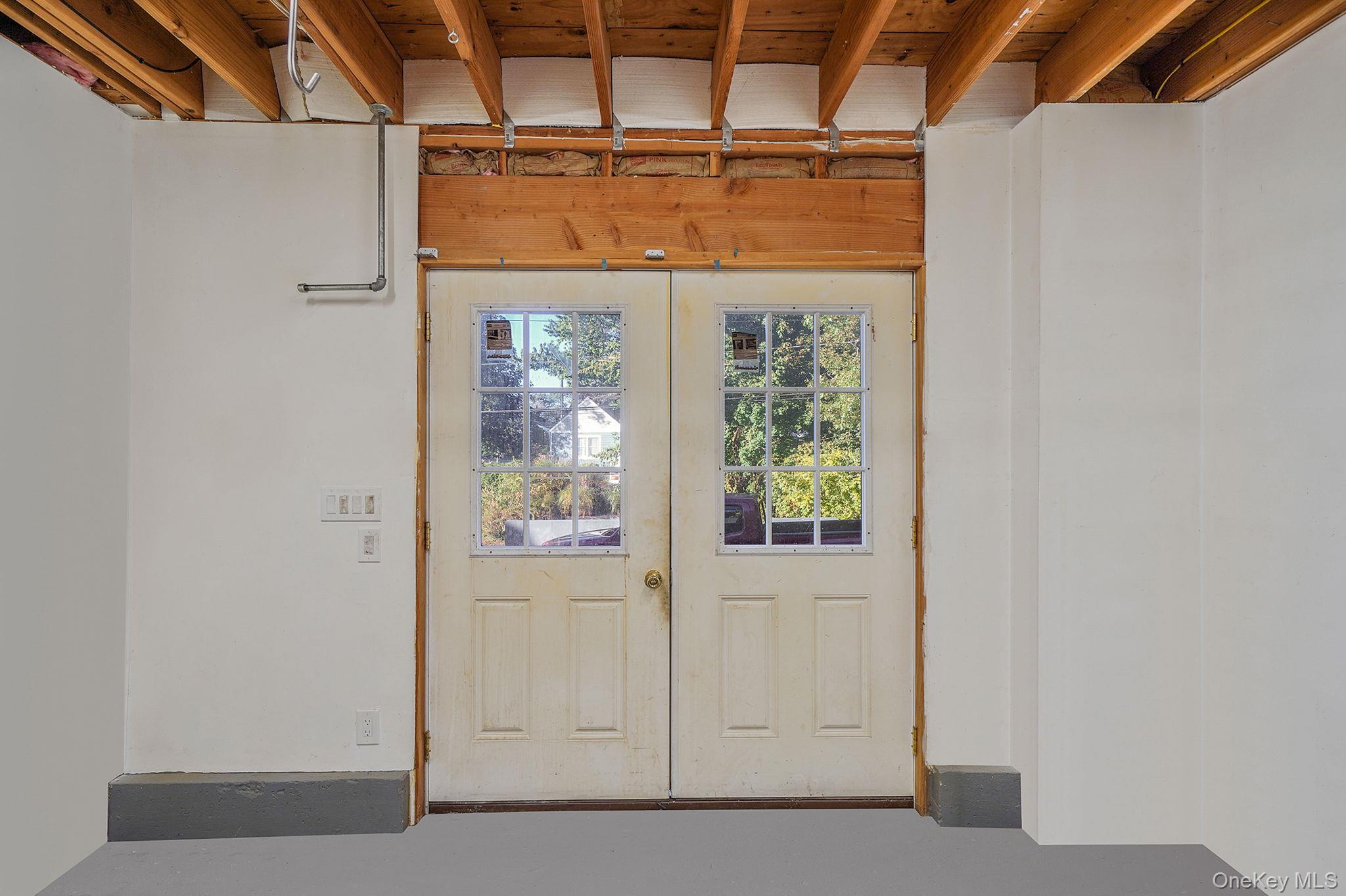 97 Locust Drive Rocky Point, NY 11778 - Photo 23 of 26 View of doorway to outside