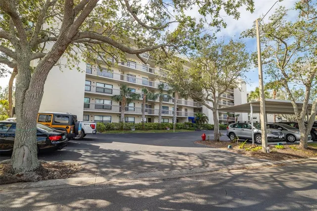 a view of street with parked cars
