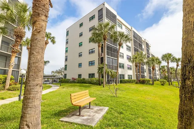 a view of a building with yard