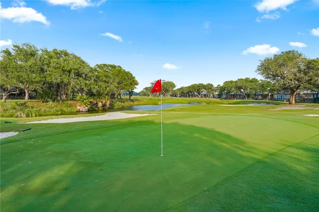 a view of an house with a big yard