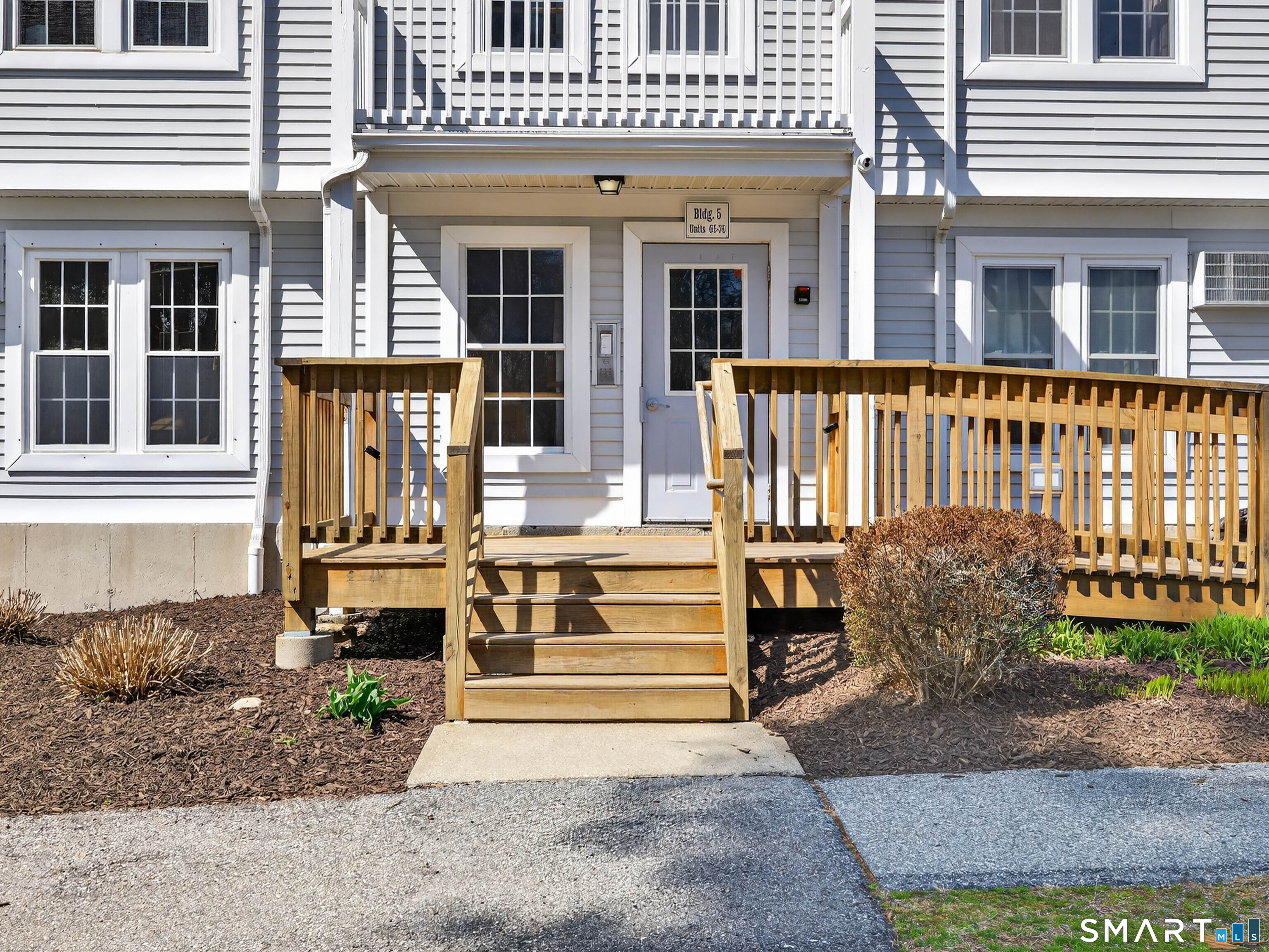 82 Sunset Street, Unit 68 Waterford, CT 06385 - Photo 17 of 20 front view of a house with a yard