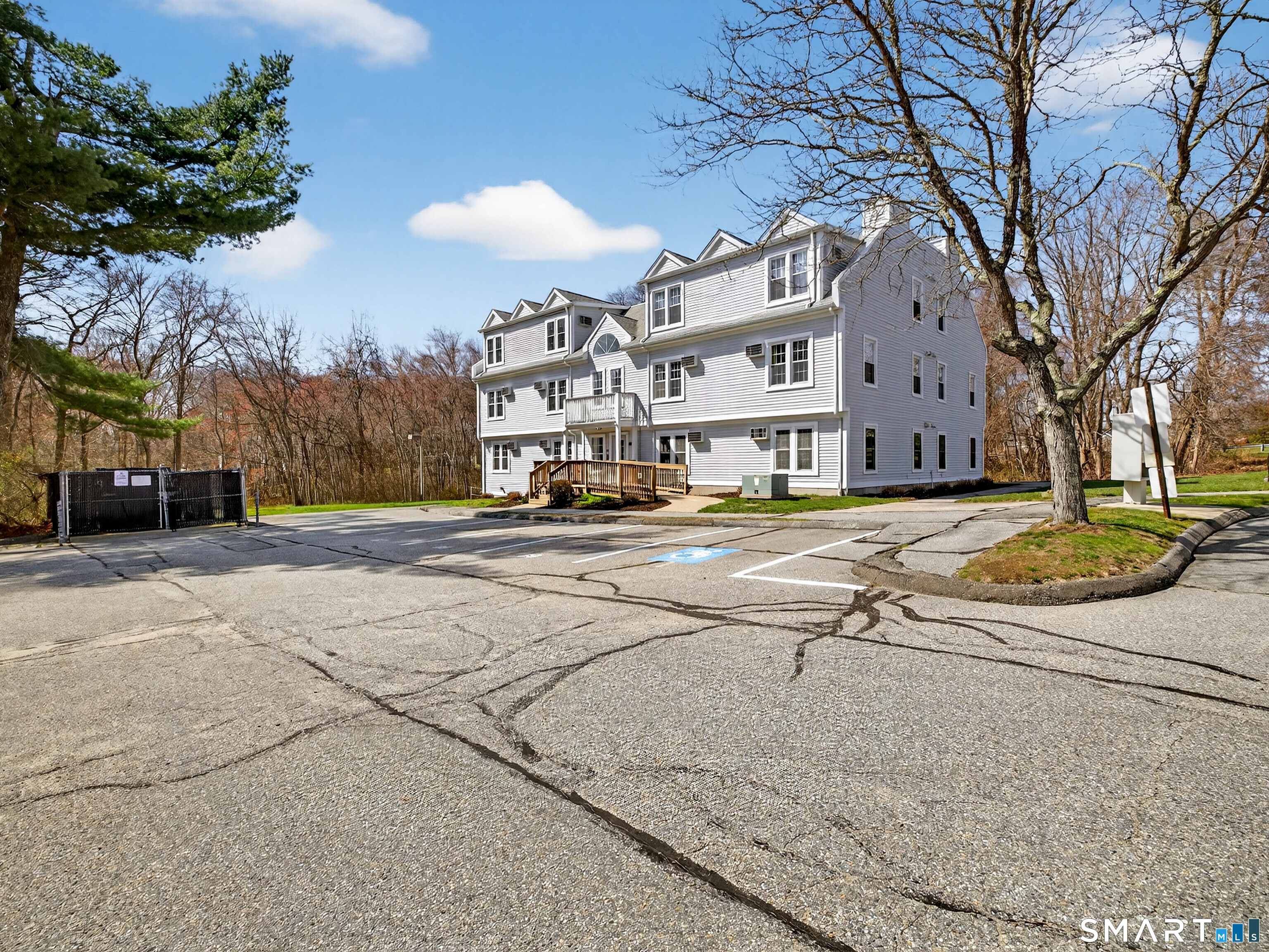 82 Sunset Street, Unit 68 Waterford, CT 06385 - Photo 18 of 20 a view of a street with houses
