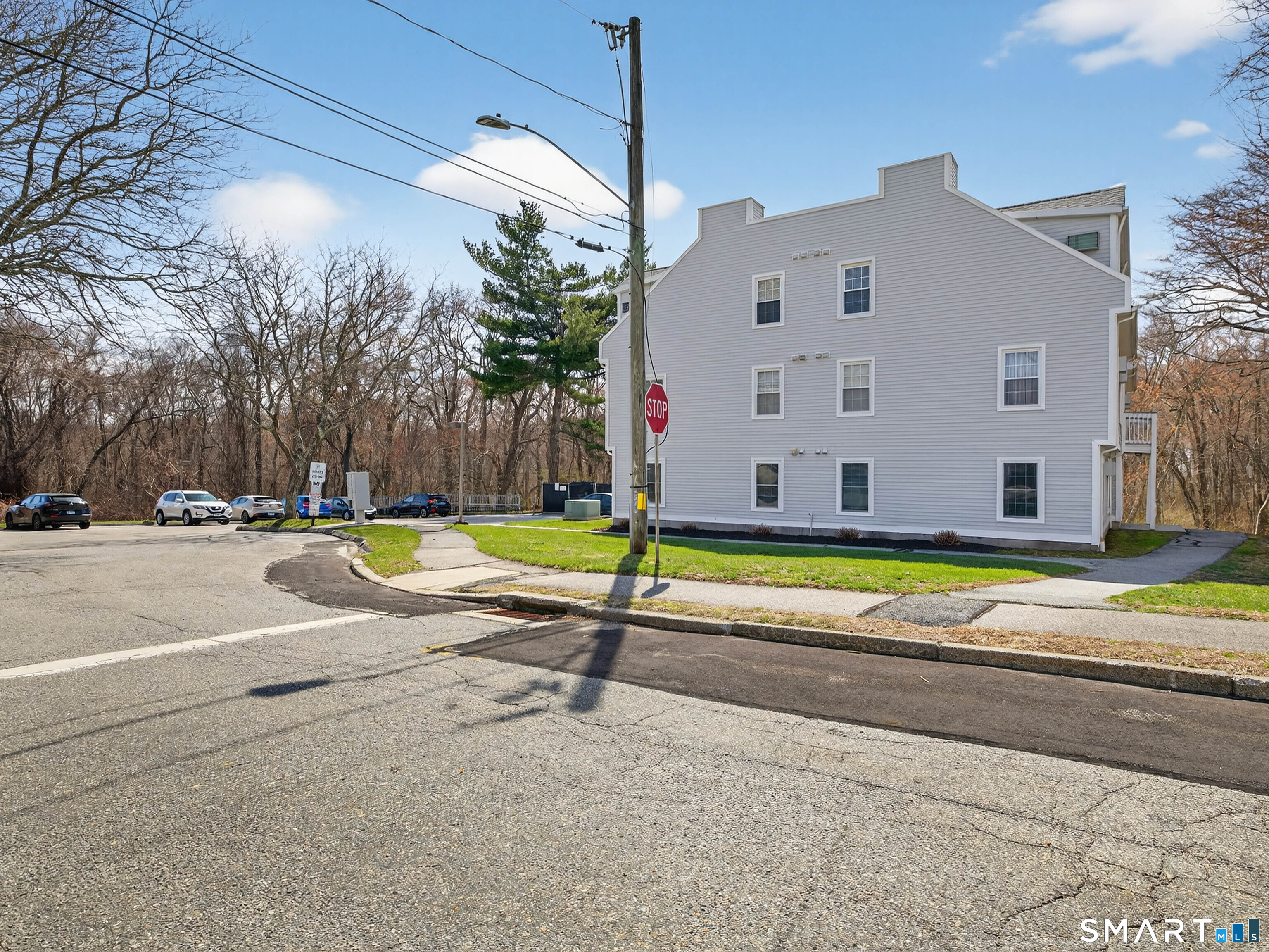 82 Sunset Street, Unit 68 Waterford, CT 06385 - Photo 19 of 20 a view of a house with a swimming pool