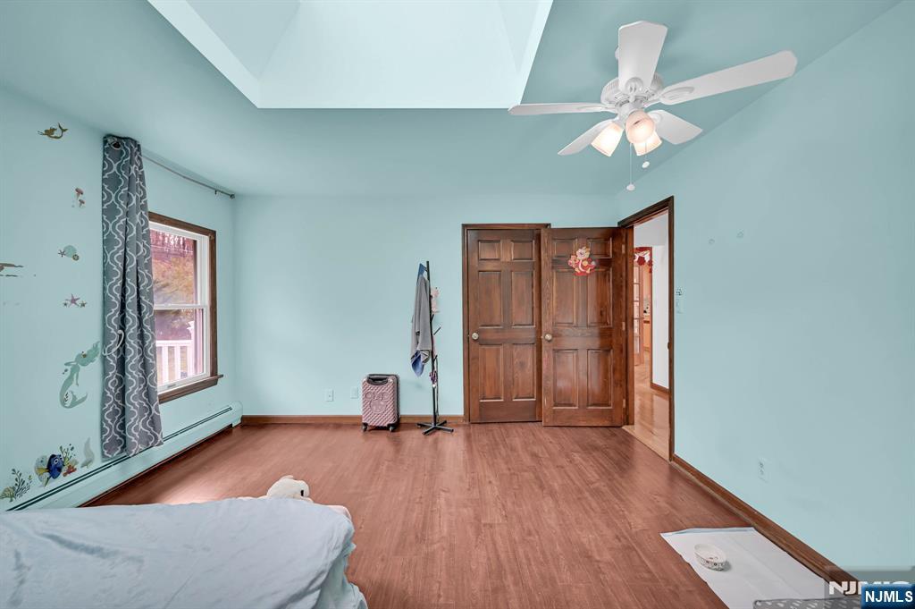 699 Shore Road West Milford, NJ 07421 - Photo 31 of 50 a view of livingroom with hardwood floor and ceiling fan