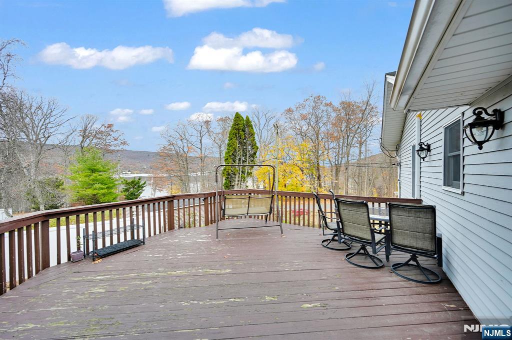 699 Shore Road West Milford, NJ 07421 - Photo 40 of 50 a view of a balcony with chairs
