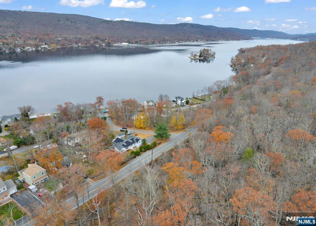 699 Shore Road West Milford, NJ 07421 - Photo 49 of 50 a view of a city and lake view