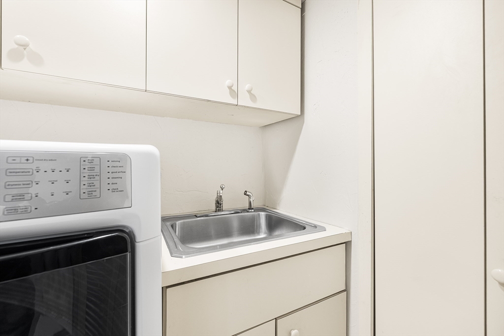 19 Johnson Avenue Winthrop, MA 02152 - Photo 17 of 42 a utility room with dryer and washer