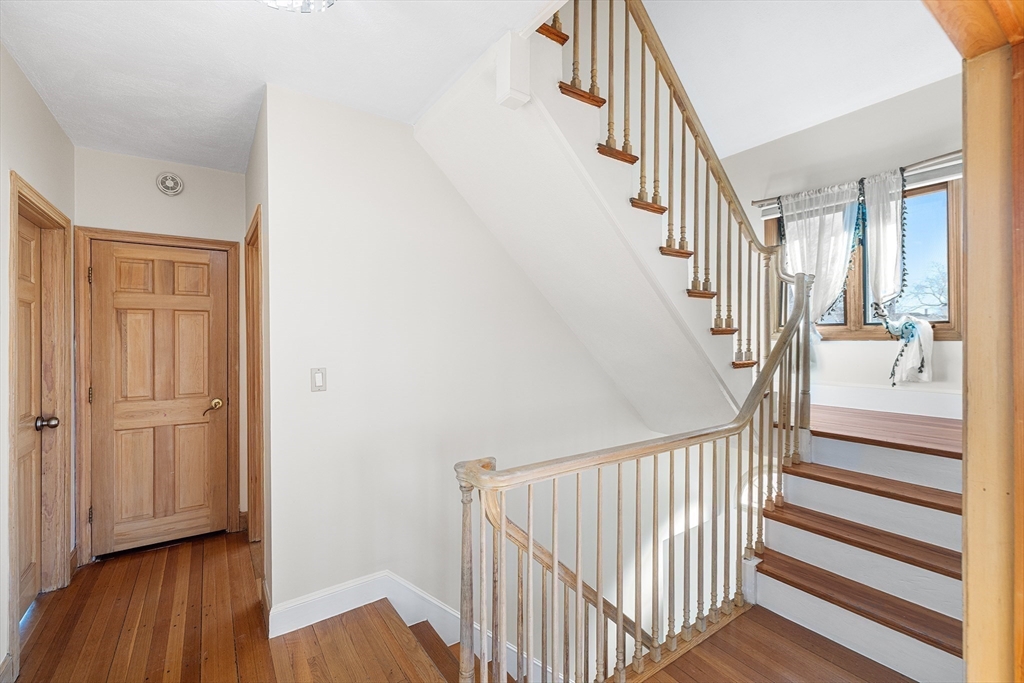 19 Johnson Avenue Winthrop, MA 02152 - Photo 21 of 42 a view of a hallway with wooden floor and entryway