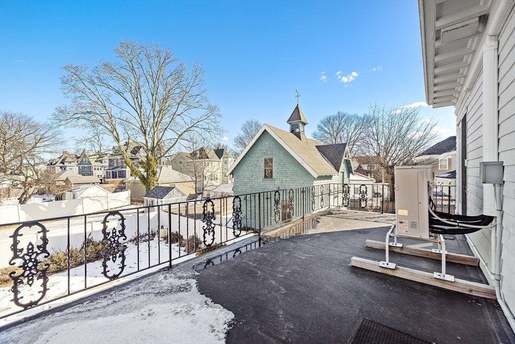 19 Johnson Avenue Winthrop, MA 02152 - Photo 31 of 42 a view of a house with wooden deck and a backyard