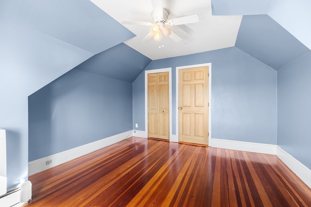 19 Johnson Avenue Winthrop, MA 02152 - Photo 35 of 42 wooden floor in an empty room with a window