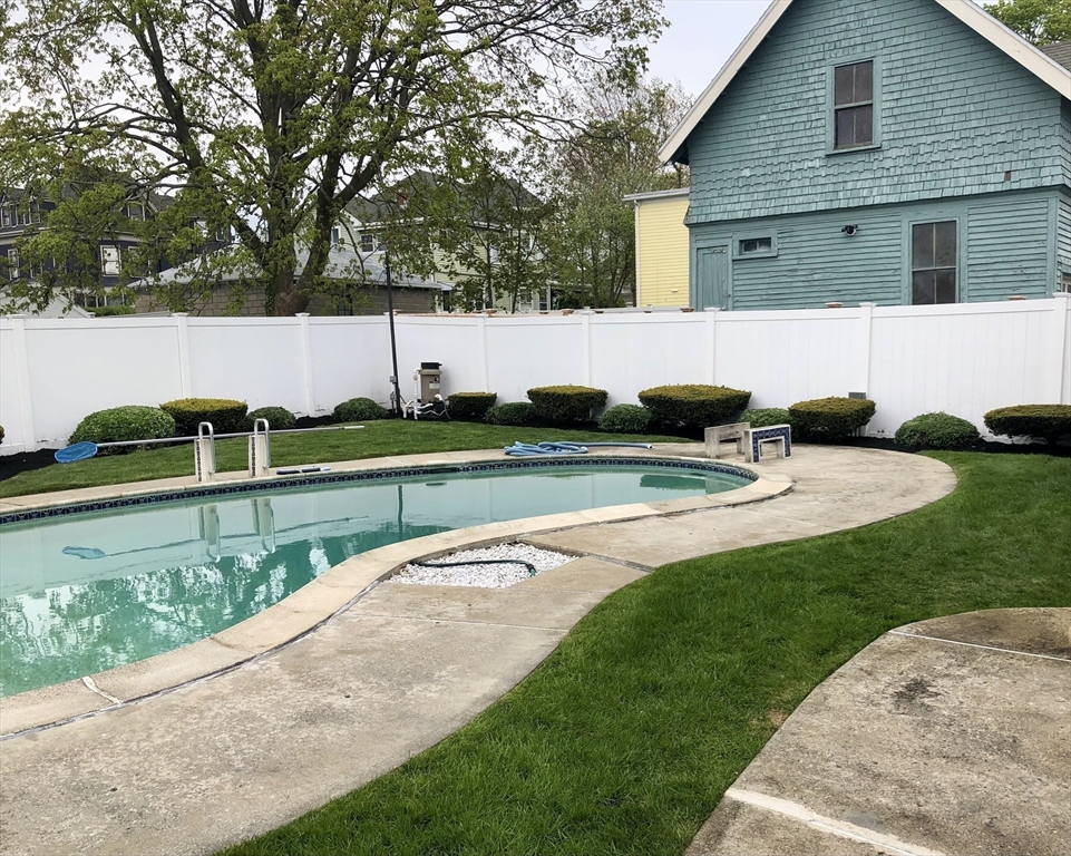 19 Johnson Avenue Winthrop, MA 02152 - Photo 39 of 42 a view of a house with a yard