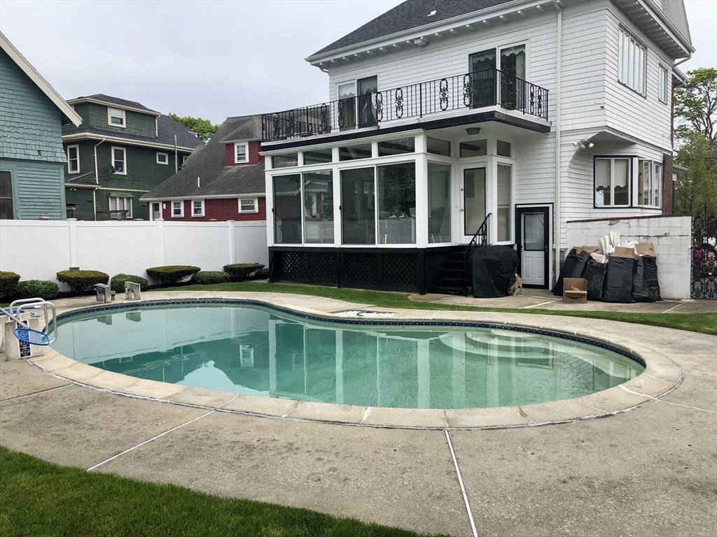 19 Johnson Avenue Winthrop, MA 02152 - Photo 40 of 42 a view of a house with a swimming pool