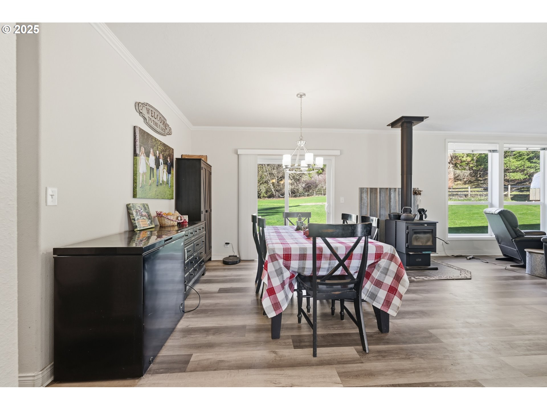 39557 Little Fall Creek Road Fall Creek, OR 97438 - Photo 12 of 43 a living room with furniture and a large window