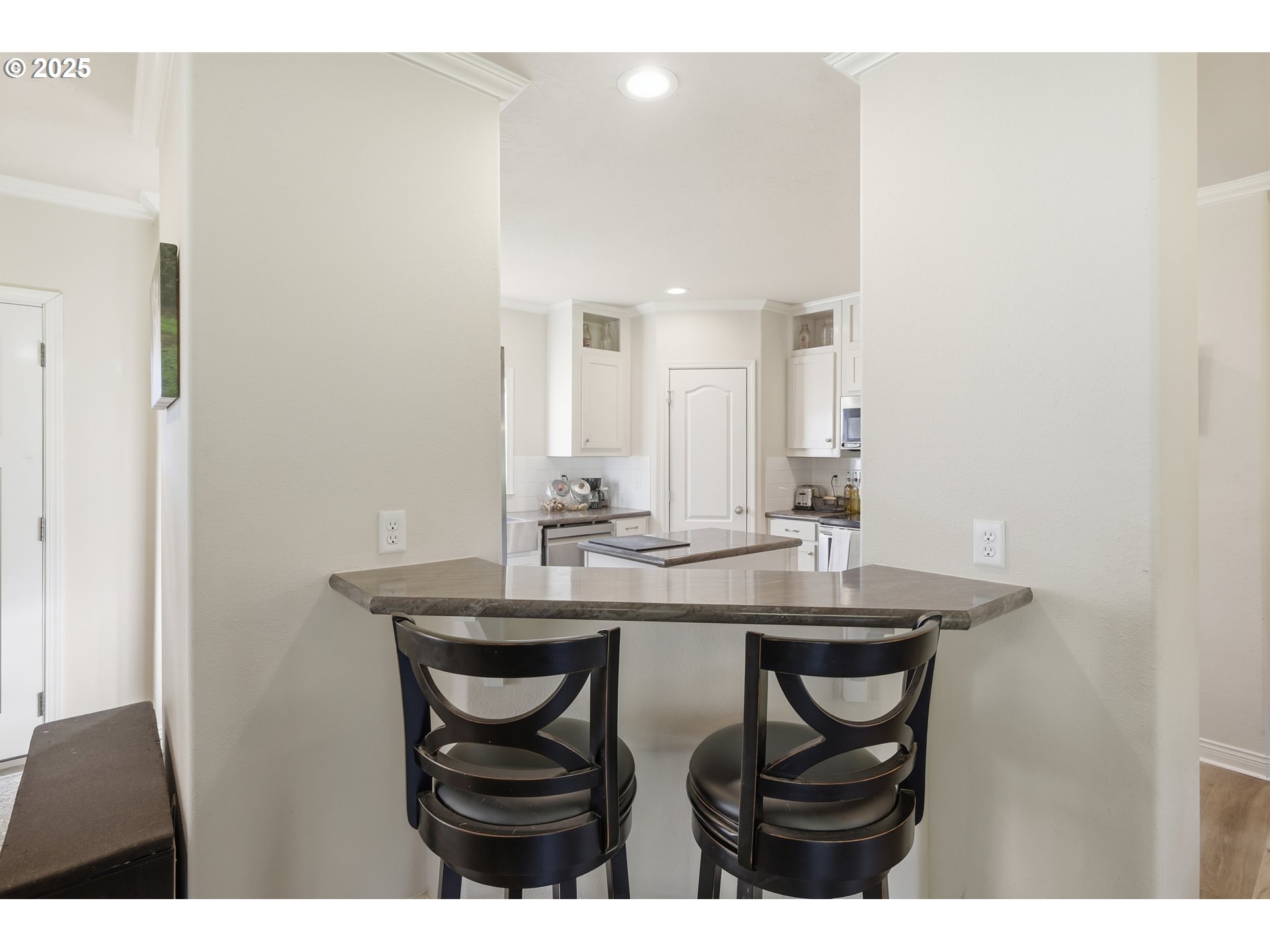 39557 Little Fall Creek Road Fall Creek, OR 97438 - Photo 13 of 43 a dining room with a sink and chairs