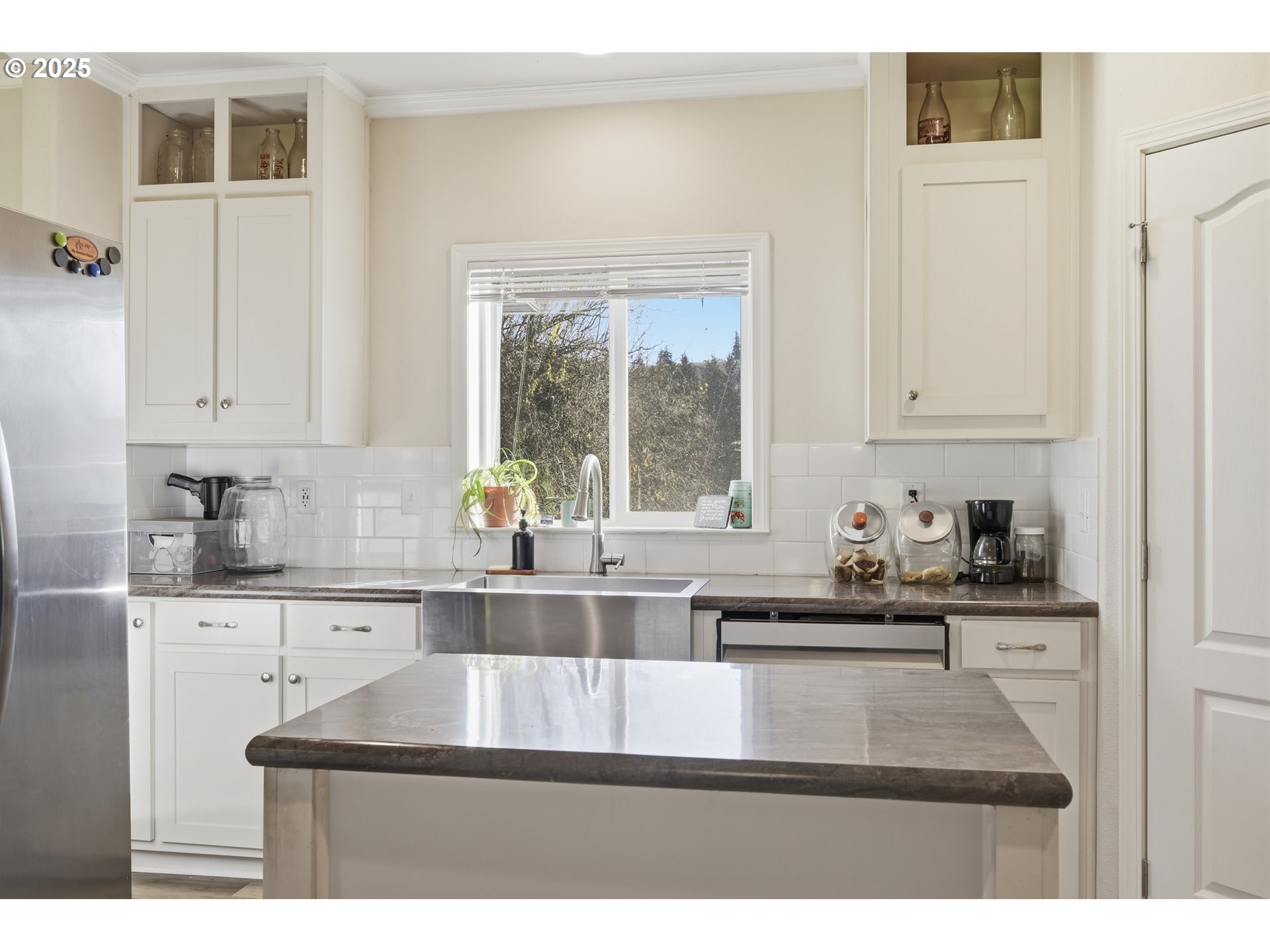 39557 Little Fall Creek Road Fall Creek, OR 97438 - Photo 17 of 43 a kitchen with stainless steel appliances granite countertop a sink window and cabinets