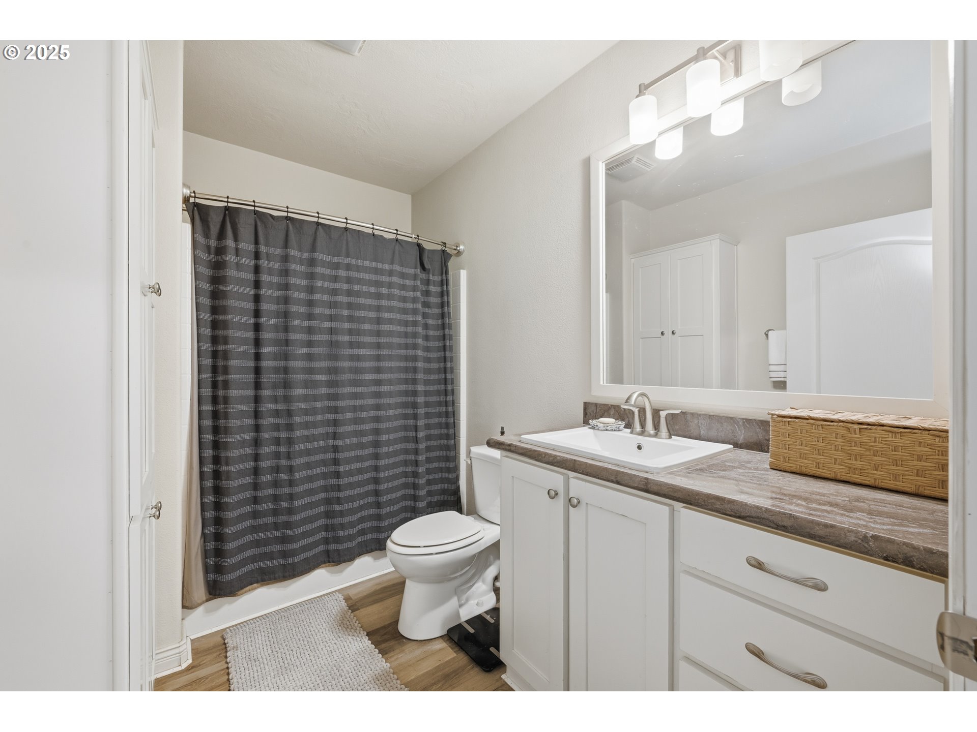39557 Little Fall Creek Road Fall Creek, OR 97438 - Photo 28 of 43 a bathroom with a sink a toilet and shower