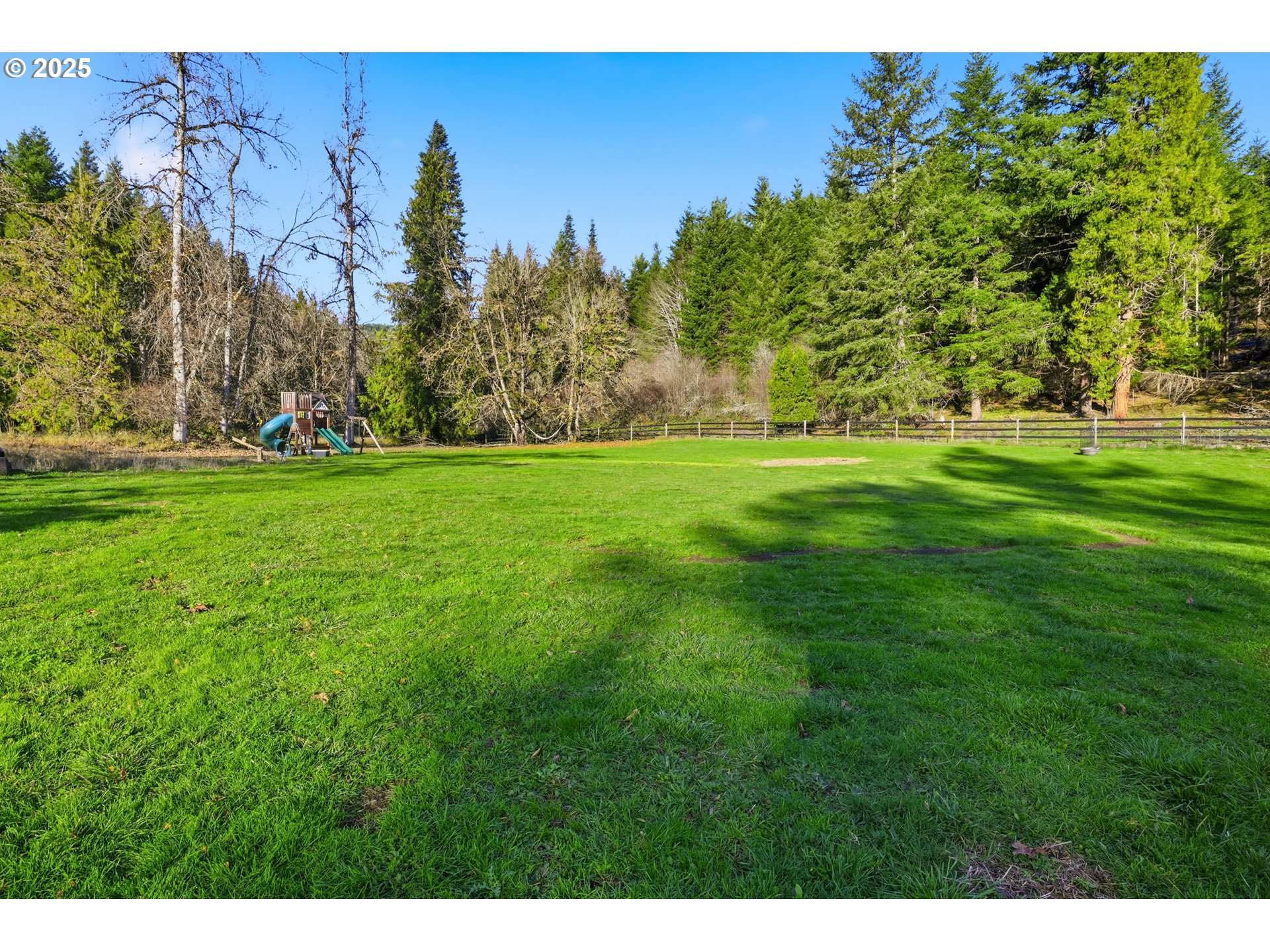 39557 Little Fall Creek Road Fall Creek, OR 97438 - Photo 34 of 43 a view of a grassy field with trees