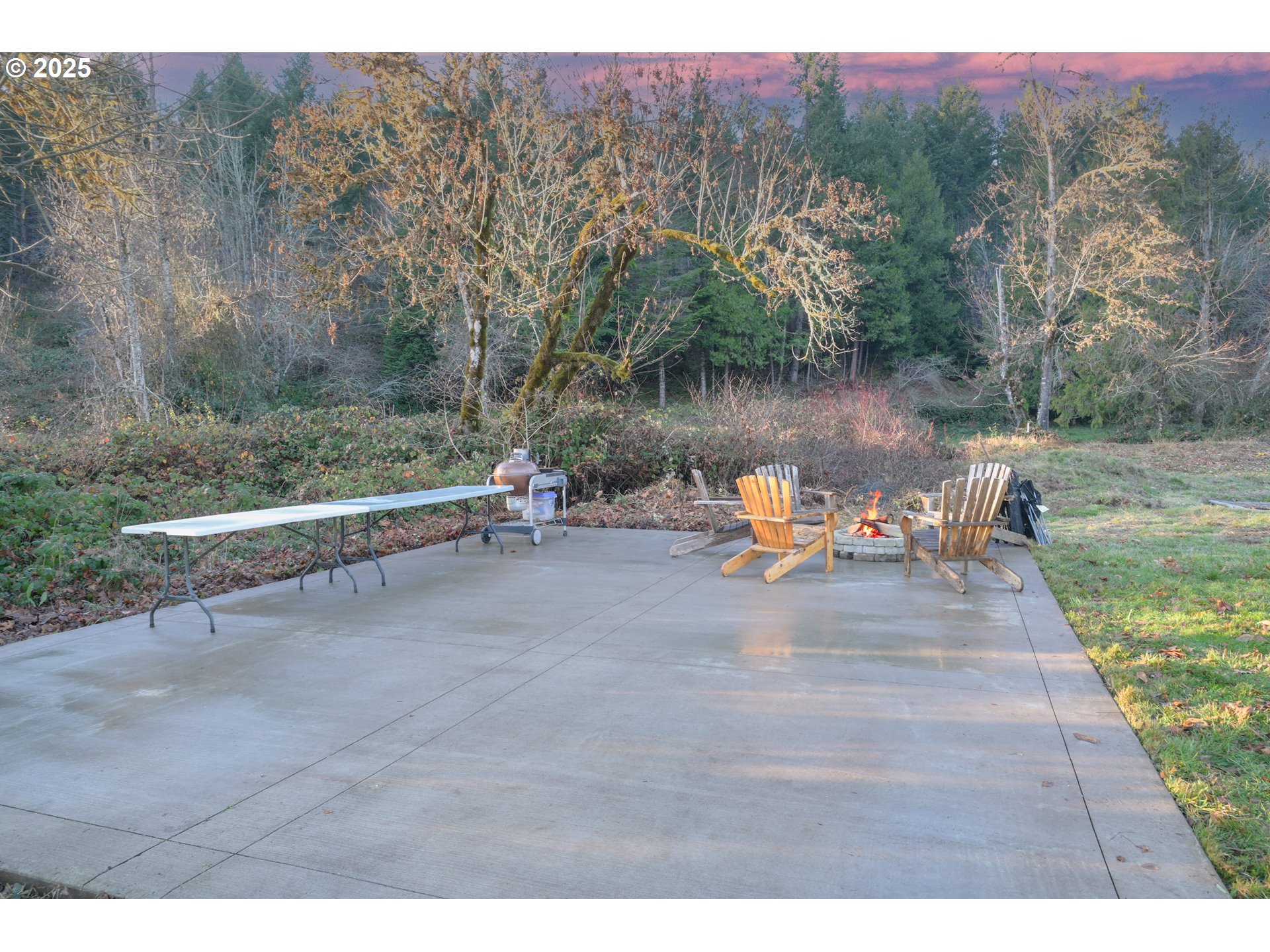 39557 Little Fall Creek Road Fall Creek, OR 97438 - Photo 43 of 43 a view of a lake with a mountain and a bench