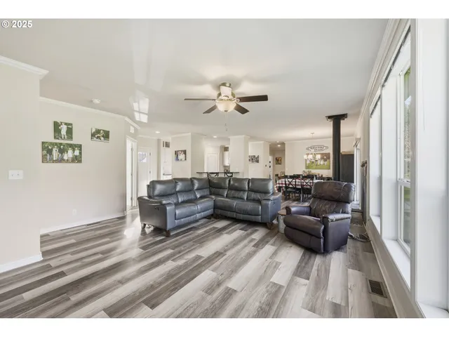 a living room with couch and a window