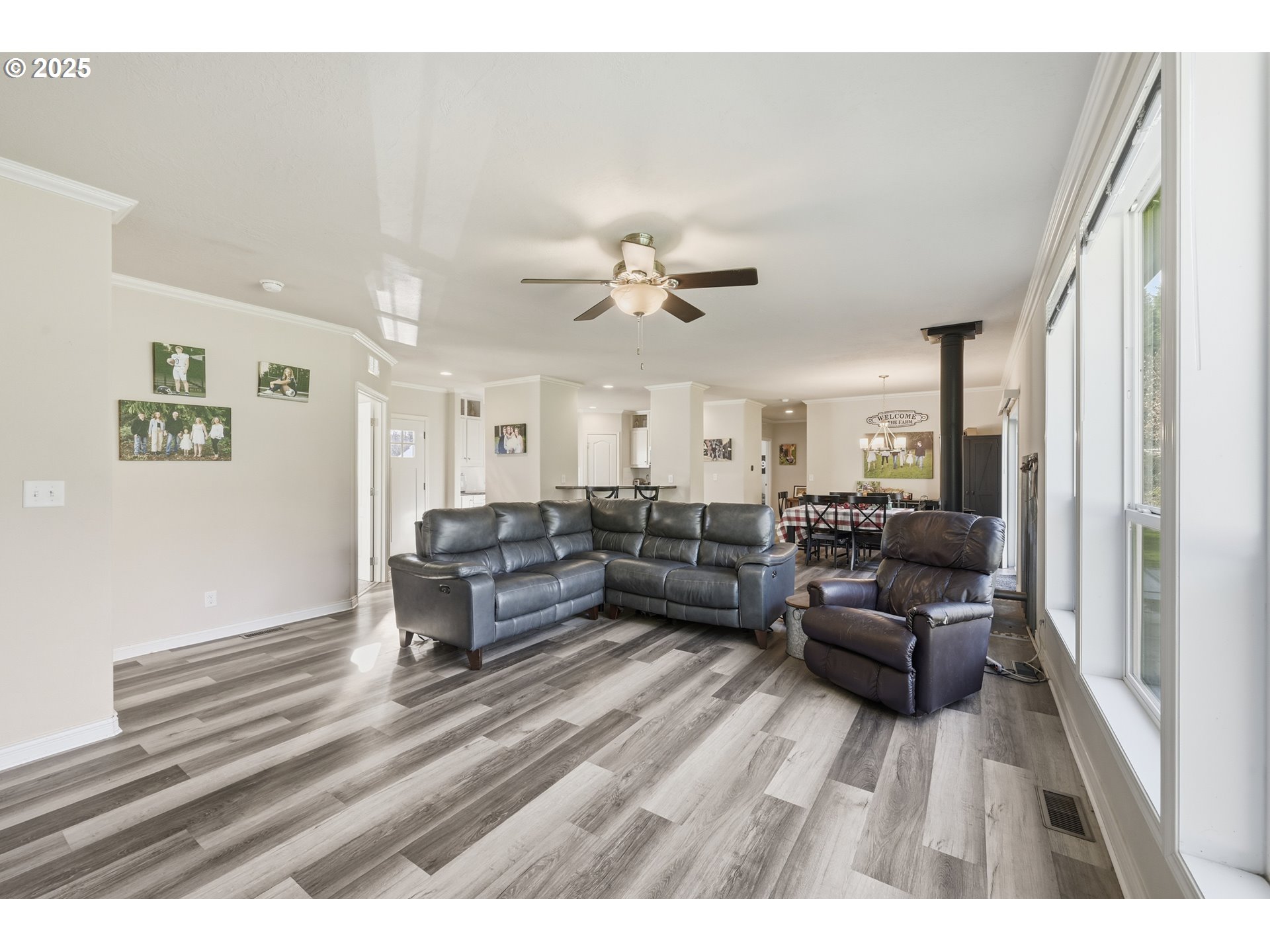 39557 Little Fall Creek Road Fall Creek, OR 97438 - Photo 8 of 43 a living room with furniture or couch and a ceiling fan