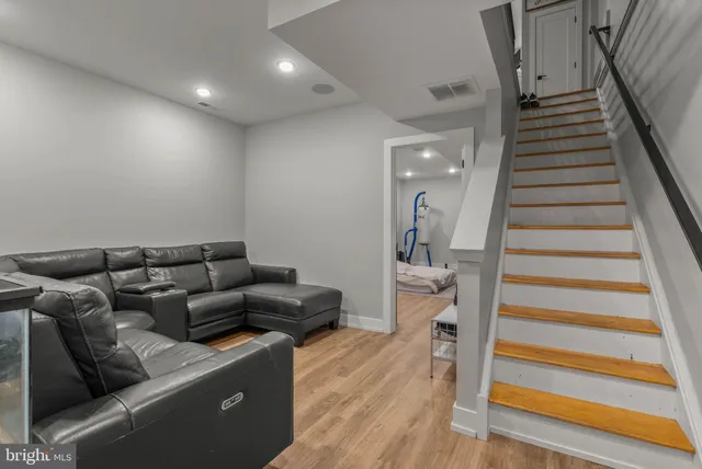 a living room with furniture and a couch