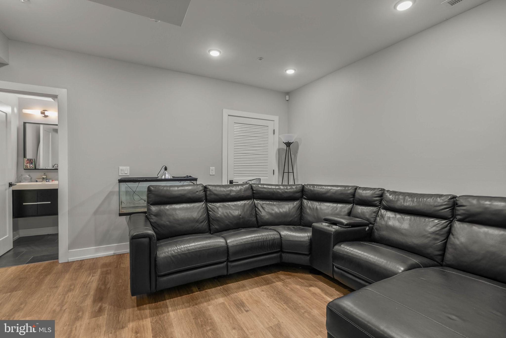 1517 North 27th Street Philadelphia, PA 19121 - Photo 14 of 31 a living room with furniture and a couch