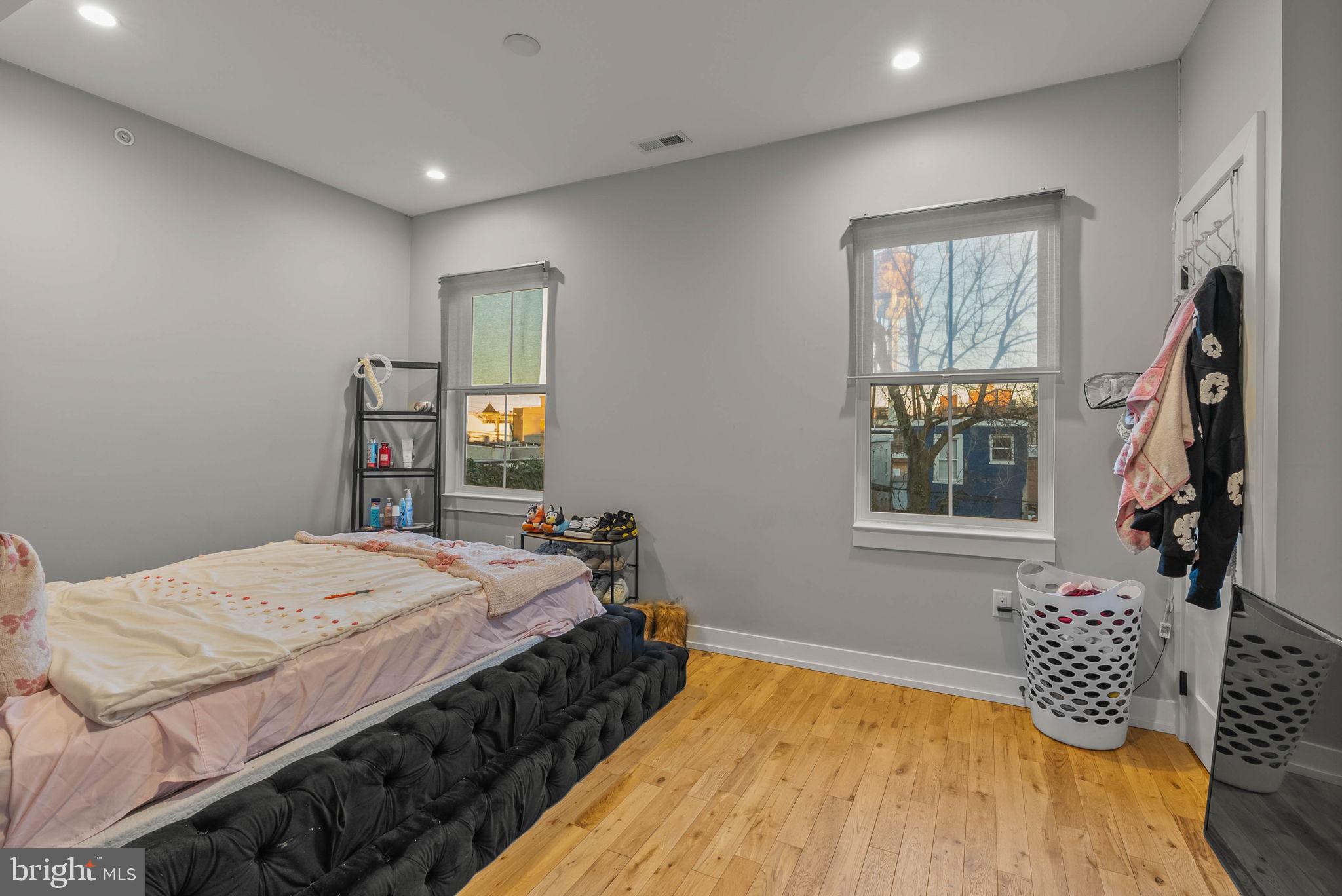 1517 North 27th Street Philadelphia, PA 19121 - Photo 19 of 31 a bedroom with a bed and a window