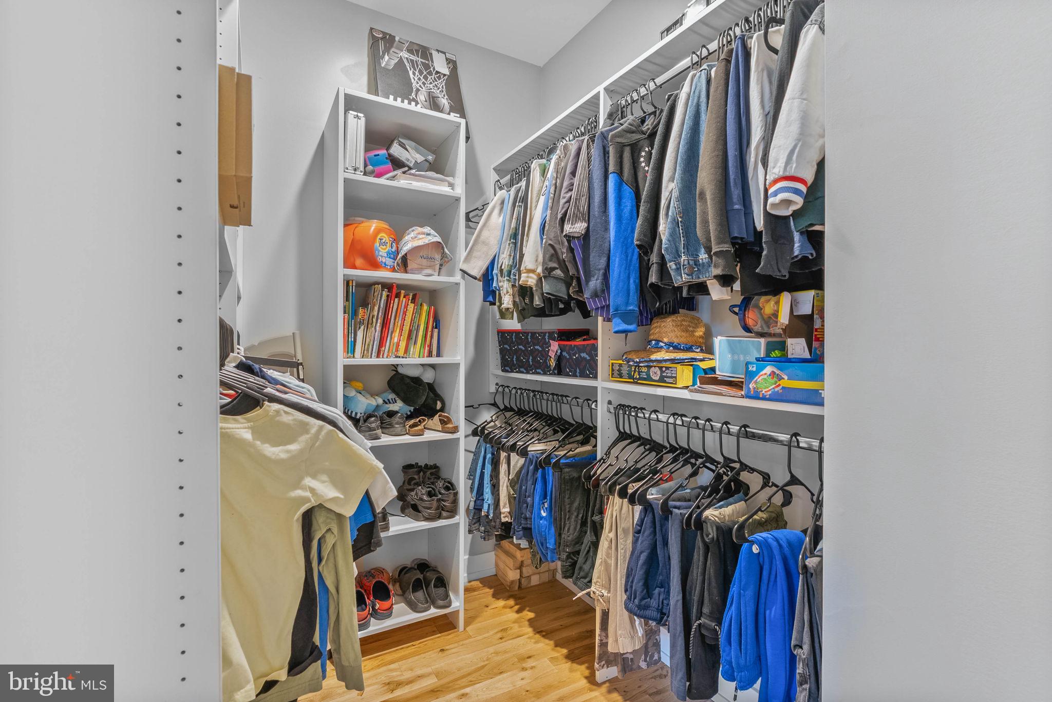 1517 North 27th Street Philadelphia, PA 19121 - Photo 24 of 31 a view of walk in closet with clothes