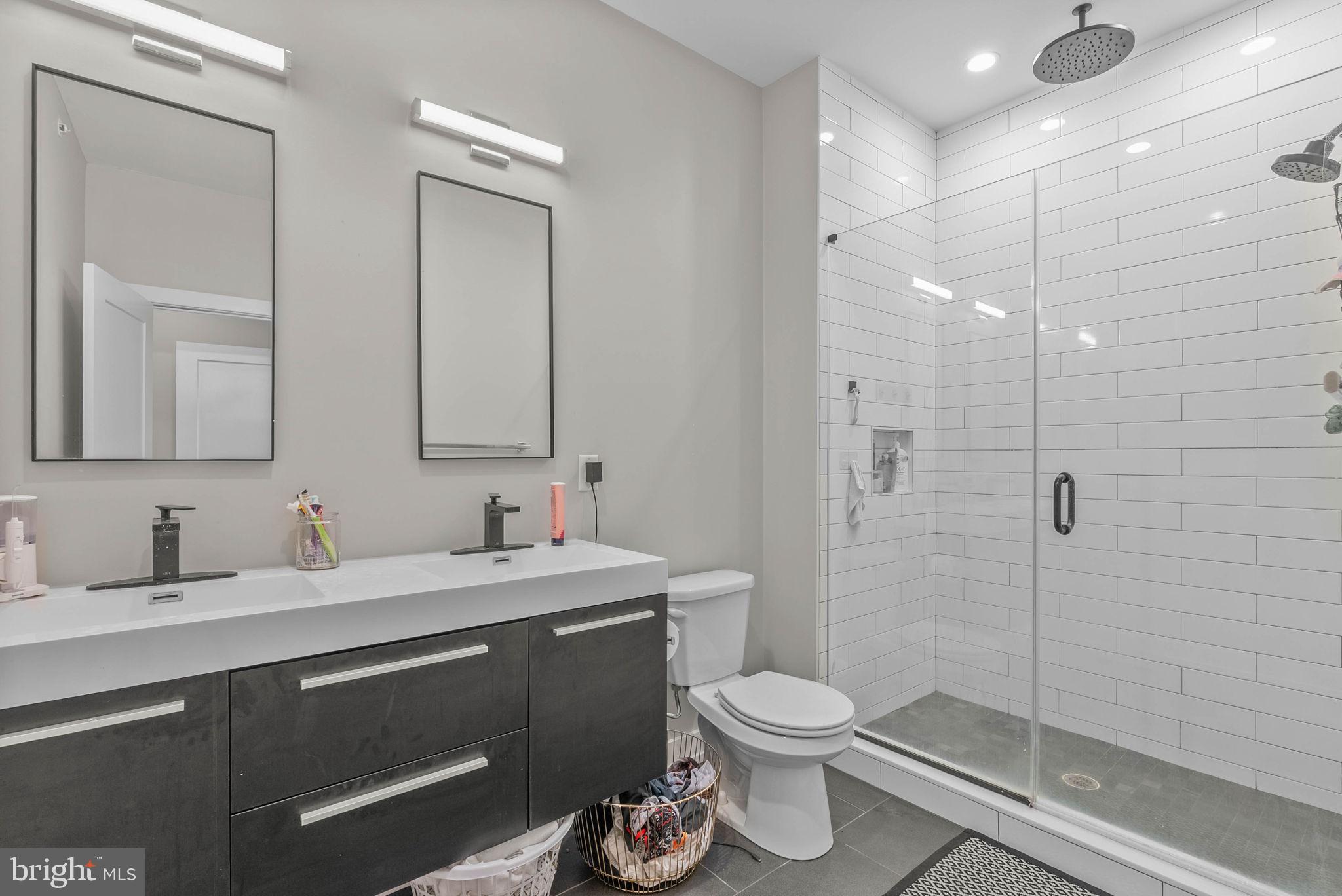 1517 North 27th Street Philadelphia, PA 19121 - Photo 26 of 31 a bathroom with a toilet sink and shower