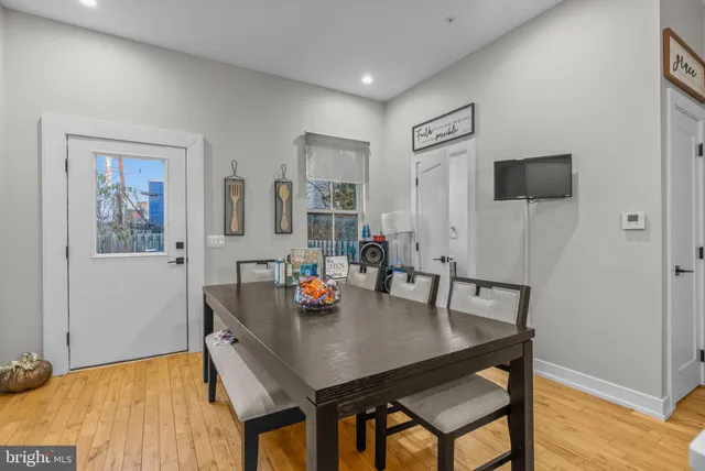 a bathroom with a sink vanity and a mirror