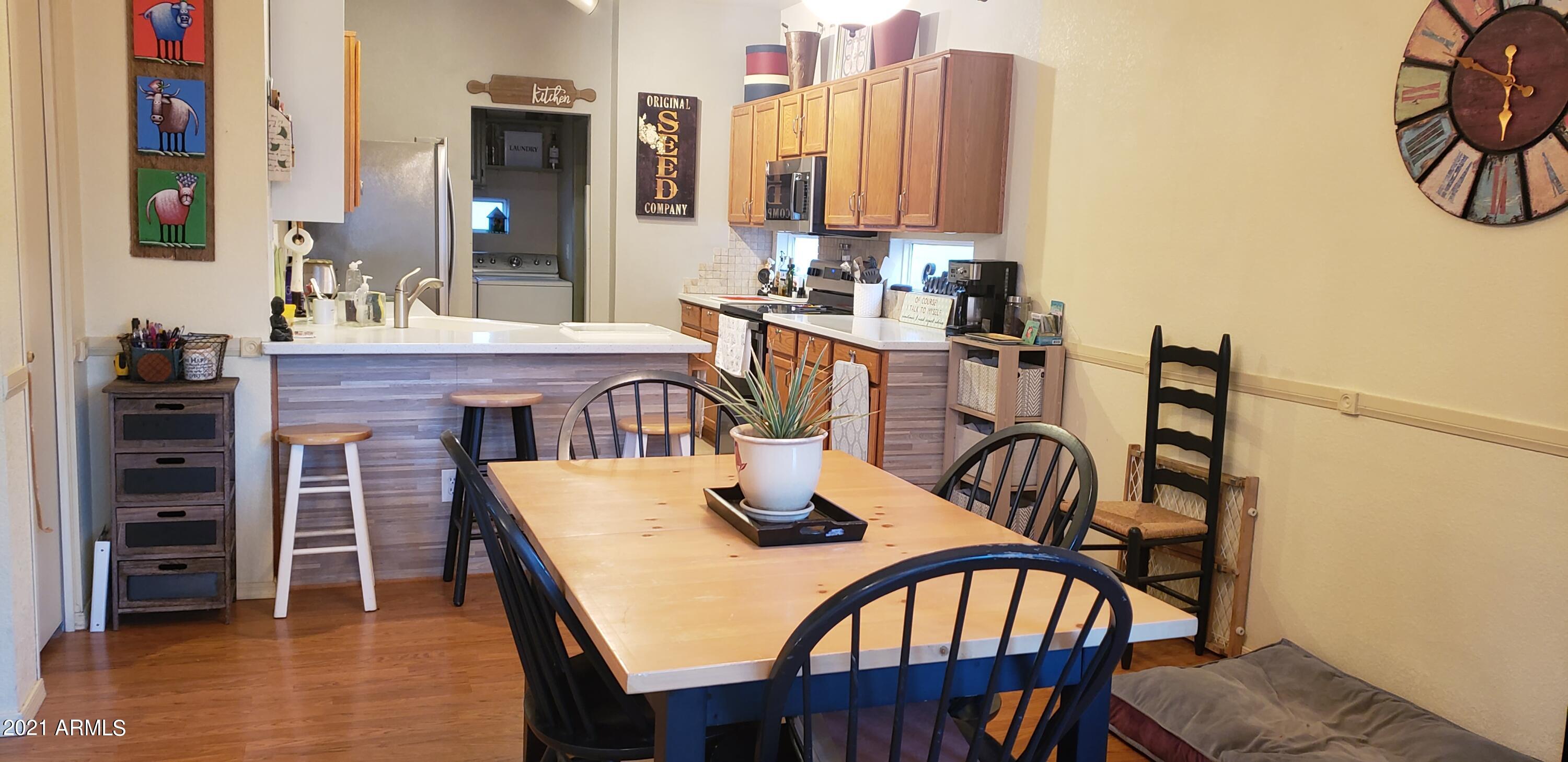 17606 North 17th Place, Unit 1033 Phoenix, AZ 85022 - Photo 6 of 23 dining w kitchen