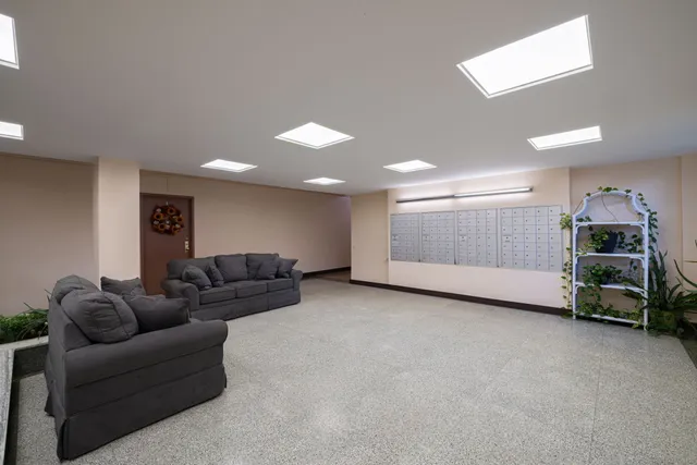 a living room with furniture and a couch