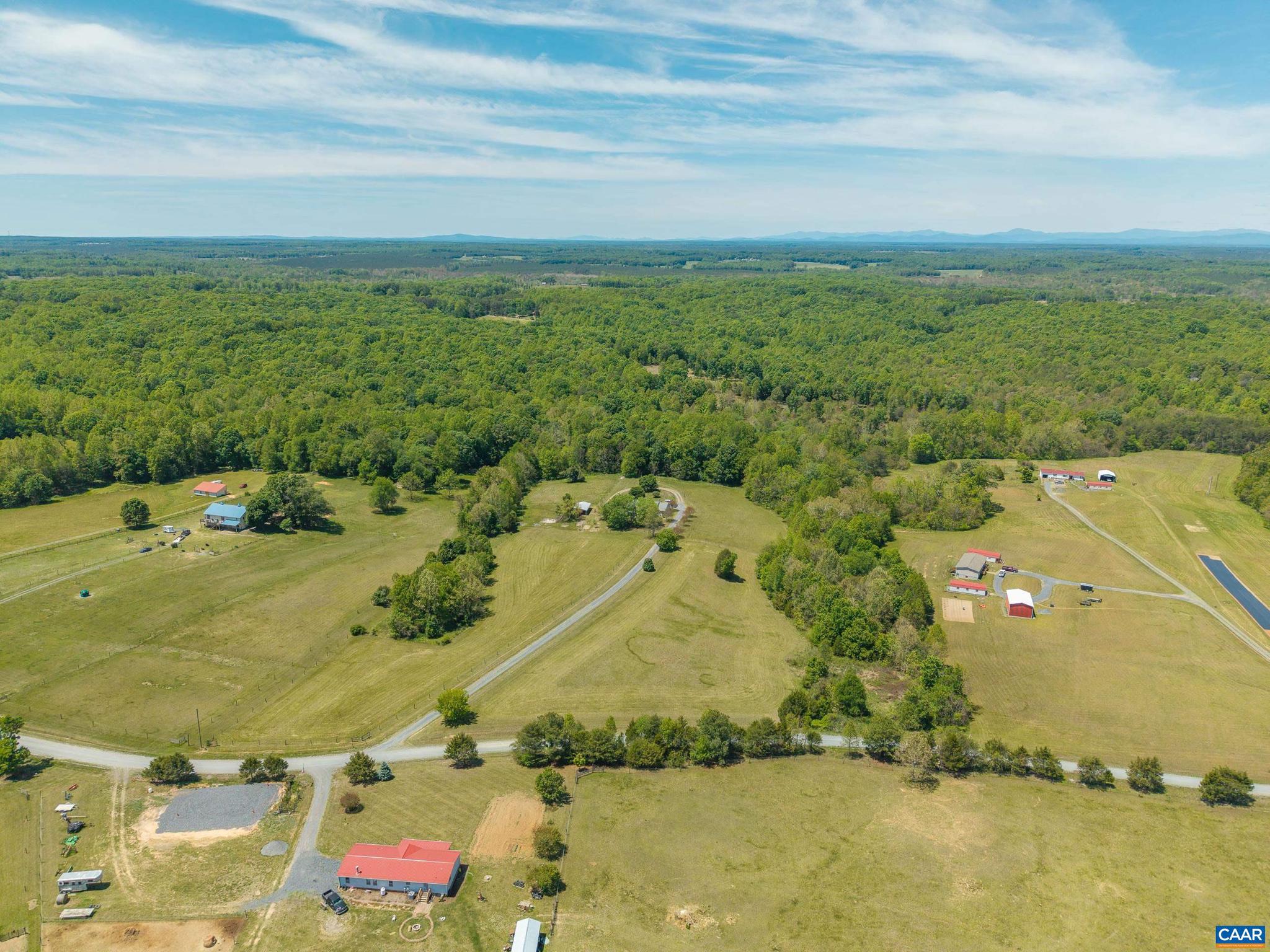 1075 Social Hall Road New Canton, VA 23123 - Photo 36 of 64 an aerial view of residential houses with outdoor space
