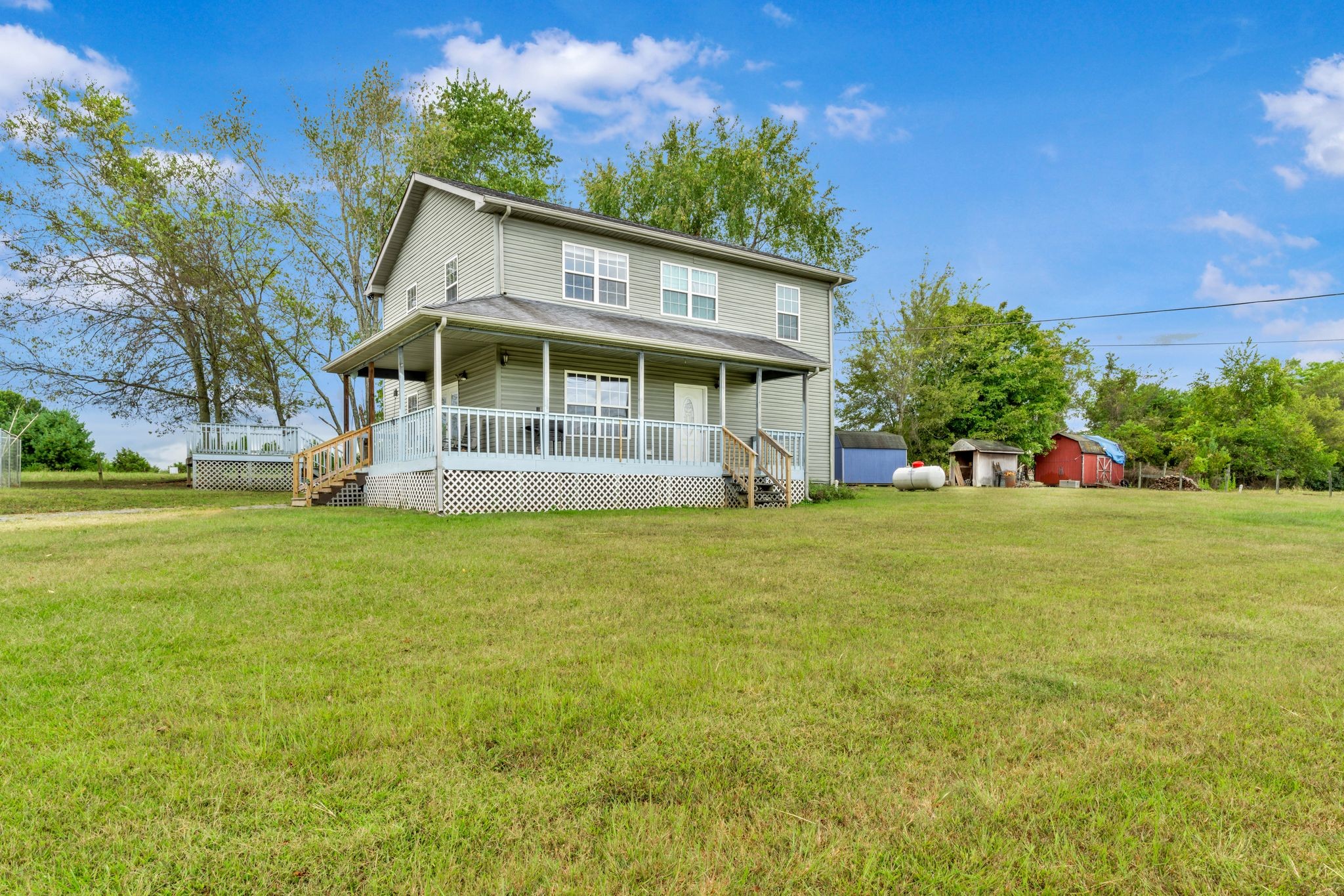 1584 Errel Dowlen Road Pleasant View, TN 37146 - Photo 3 of 28 a front view of a house with garden