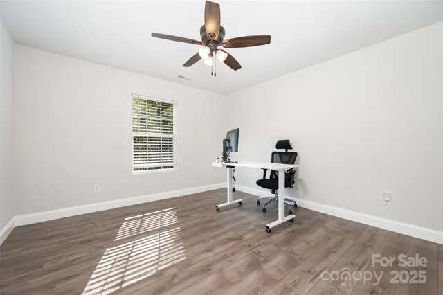 a workspace with wooden floor