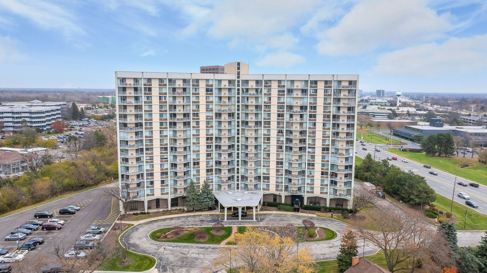 40 North Tower Road, Unit 4M Oak Brook, IL 60523 - Photo 14 of 17 a view of building with swimming pool and outdoor space