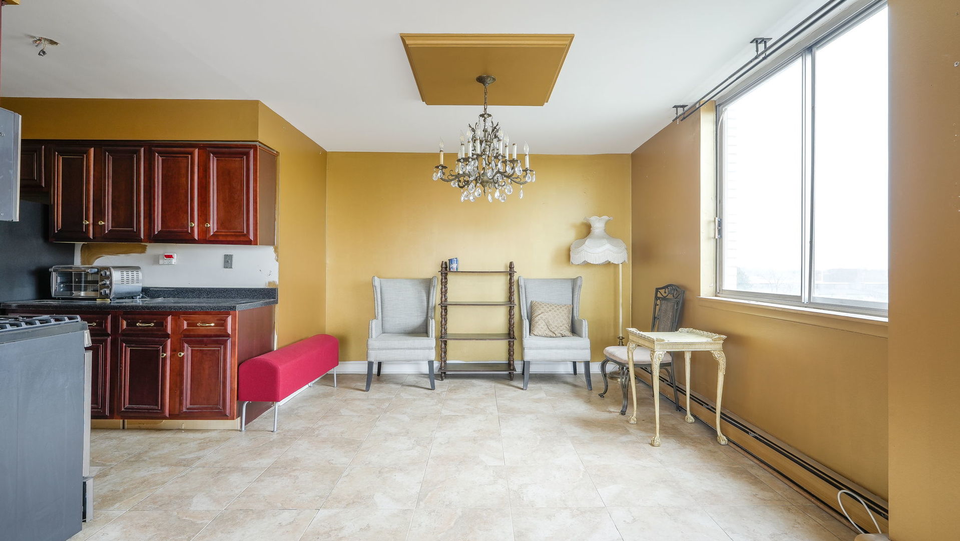 40 North Tower Road, Unit 4M Oak Brook, IL 60523 - Photo 3 of 17 a living room with furniture and a chandelier